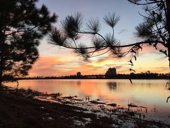 Scenic view of lake against sky during sunset