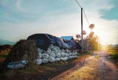 Rock formations on land against sky during sunset