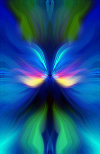 Digital composite image of light painting against blue background