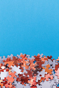 High angle view of toy on table against blue background