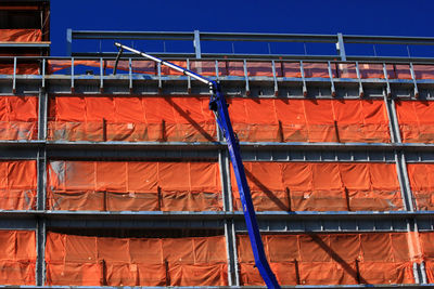 Low angle view of building against blue sky