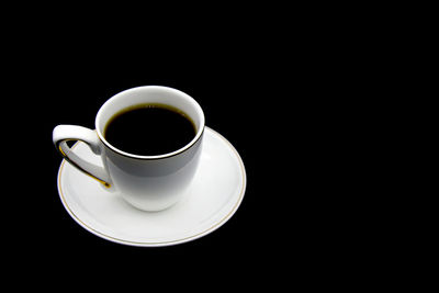 High angle view of coffee cup on table