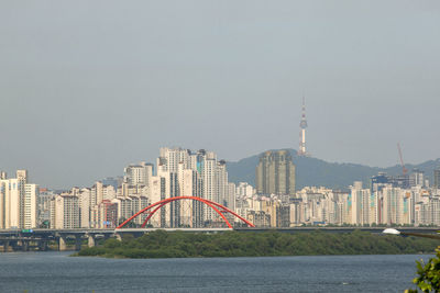 Bridge by han river against clear sky in city