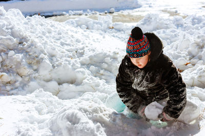 Full length of woman in snow