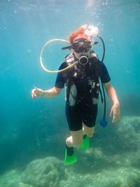 Full length of man swimming in sea