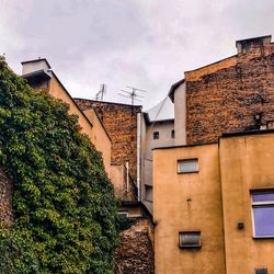 Low angle view of houses against sky