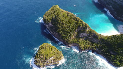 High angle view of rock formation in sea