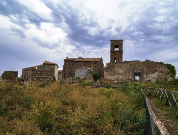 Low angle view of old building against sky