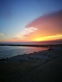 Scenic view of sea at sunset