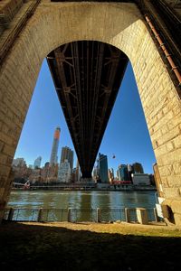 Low angle view of bridge over river
