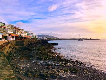 Scenic view of sea against sky during sunset