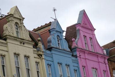 Low angle view of buildings against sky