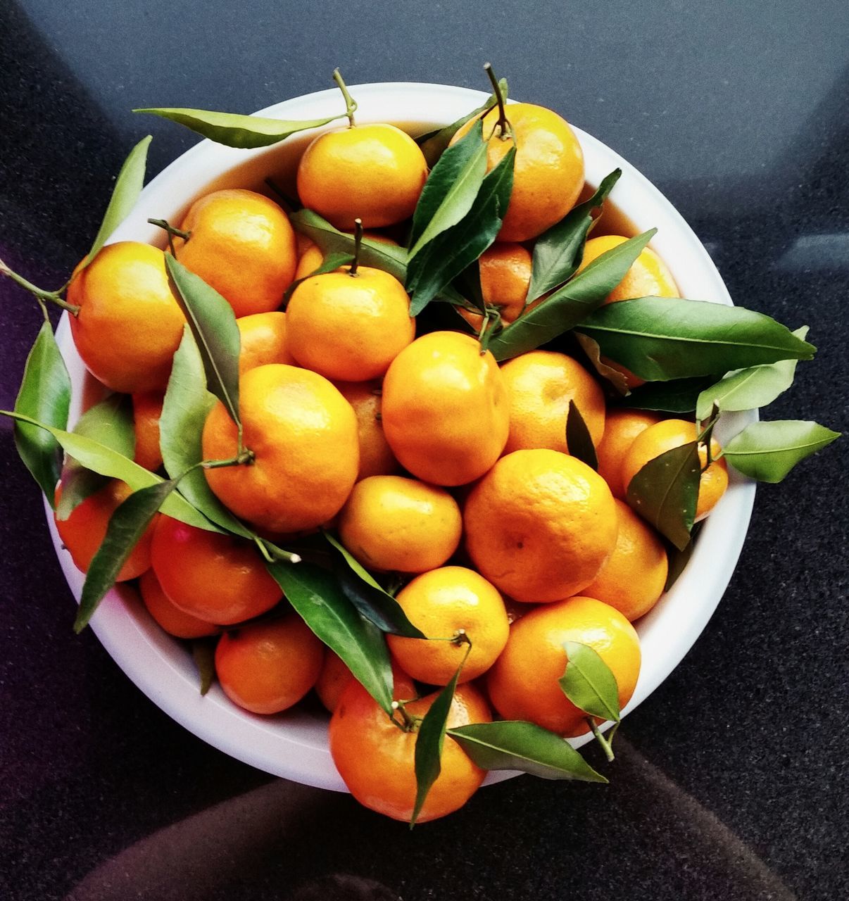 food and drink, healthy eating, food, freshness, fruit, vegetable, indoors, still life, tomato, organic, table, high angle view, leaf, ripe, close-up, raw food, large group of objects, orange - fruit, orange color, no people