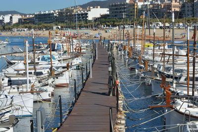 High angle view of boats moored at harbor