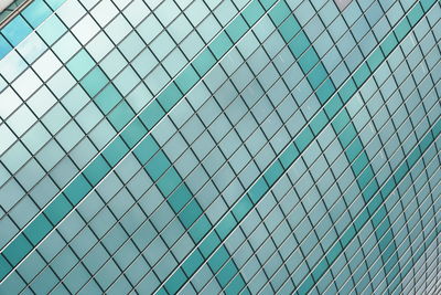 Low angle view of chainlink fence against sky