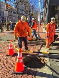 Men working at orange construction site