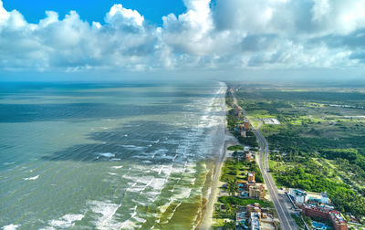 Beautiful caribbean road with palm trees along the coast of venezuela, tucacas hotel zone