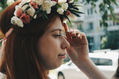 Close-up of young woman wearing tiara