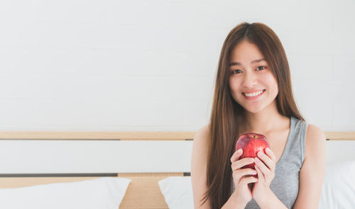 Portrait of a smiling young woman