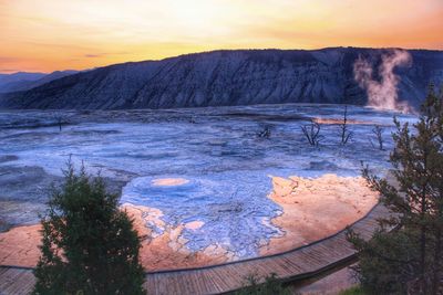 Scenic view of lake during sunset