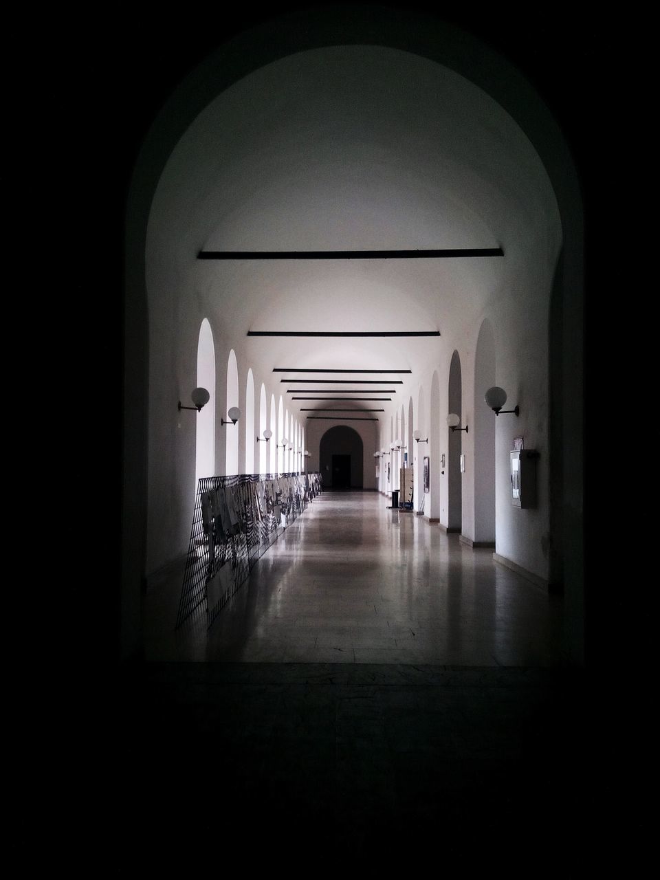 arch, architecture, built structure, indoors, the way forward, archway, entrance, diminishing perspective, architectural column, corridor, day, incidental people, arched, place of worship, in a row, religion, building exterior, gate, column, empty