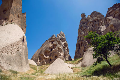 Old town of uchisar in turkey houses and the fortress in the summer in sunny weather