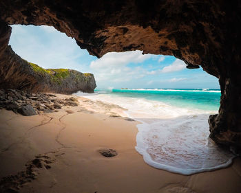 Scenic view of beach against sky