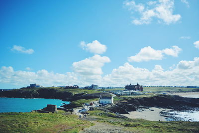 Scenic view of sea against blue sky