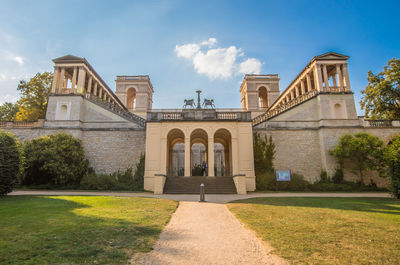 Facade of historic building against sky