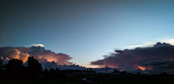 Scenic view of silhouette landscape against sky during sunset