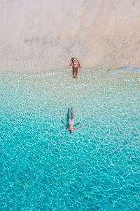 High angle view of man swimming in pool