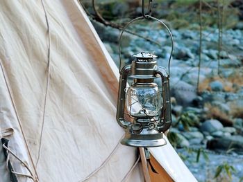 Close-up of electric lamp hanging