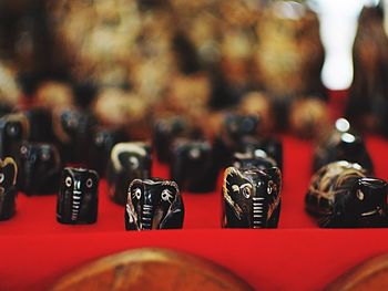 High angle view of figurines for sale on table in store