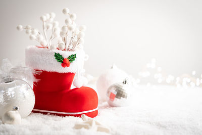 Close-up of christmas decoration on snow