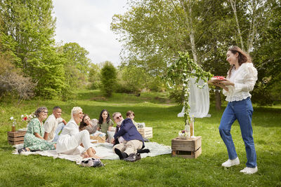 Family having picnic on grass