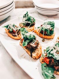 High angle view of bruschetta served in tray on table