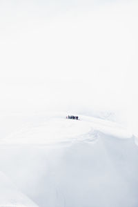 Snow storm cliff mountain