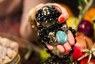 Close-up of hand holding fruit