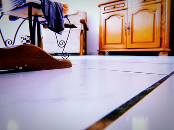 Close-up of empty chair on table at home