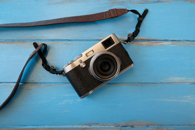 High angle view of camera on table
