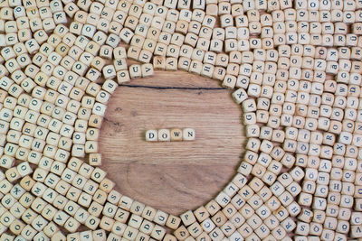 High angle view of text on wood