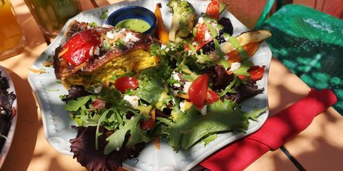 High angle view of fruits in plate on table