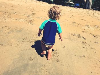 Full length of girl on sand at beach