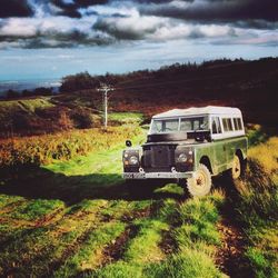 Road passing through field