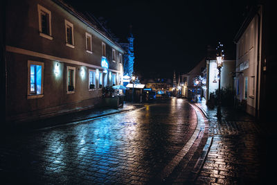 Illuminated street at night