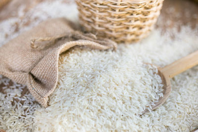 High angle view of rice spilling on table