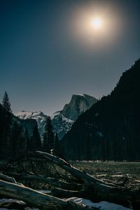 Scenic view of snowcapped mountains against sky during winter