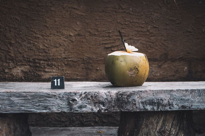 Close-up of pumpkin on wood