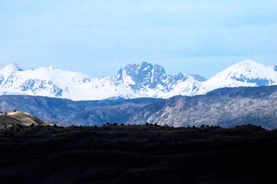 Scenic view of mountains against sky during winter