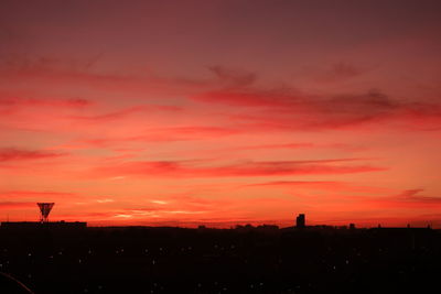Silhouette of landscape against dramatic sky